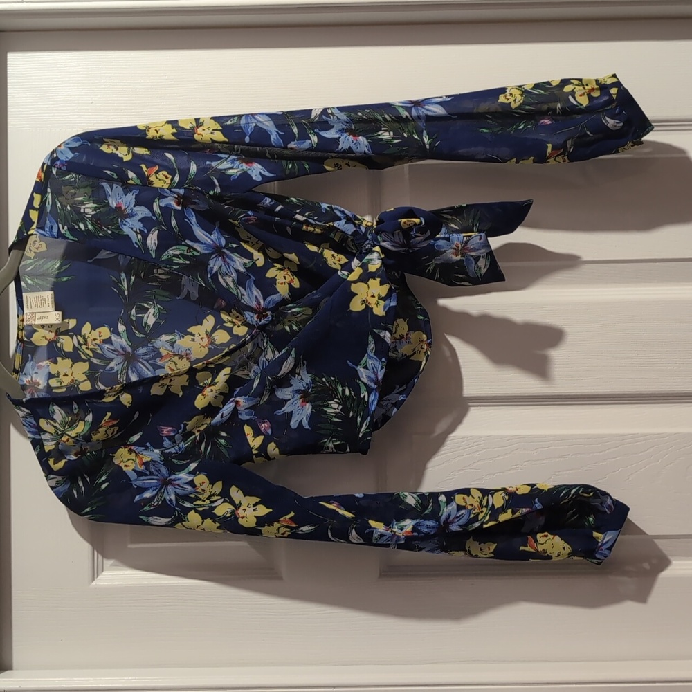 Blue long sleeved floral top